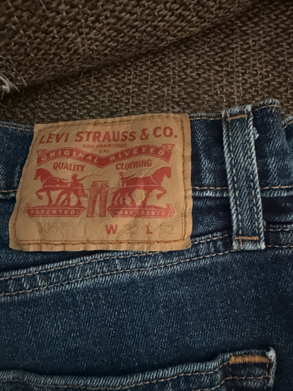 Levi's Dark Blue Denim Jeans with Tan Leather Patch